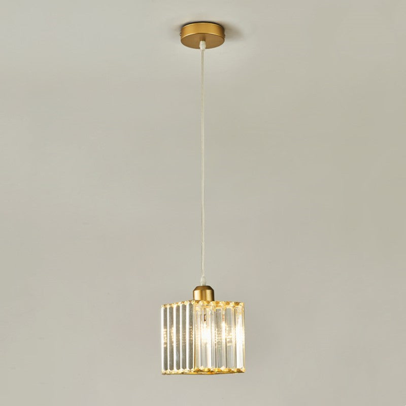 Single gold Herbert square glass pendant with a small round canopy against a pale background