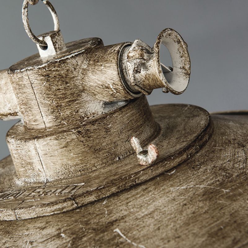 Close view of Alessio distressed upper housing, loop detail and shade brim