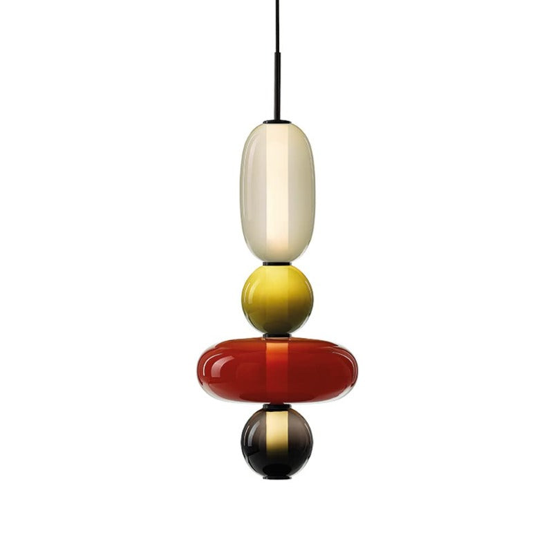 Four-form pendant: pale capsule, small olive-toned globe, red flattened oval and small smoked globe