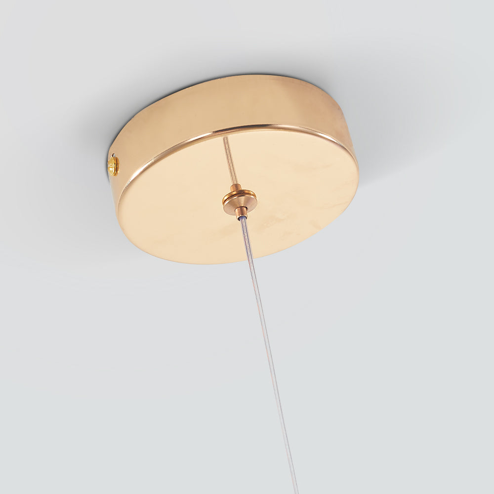 Close view of Hailie’s round gold-tone single-light ceiling canopy, centre cord entry and side screw