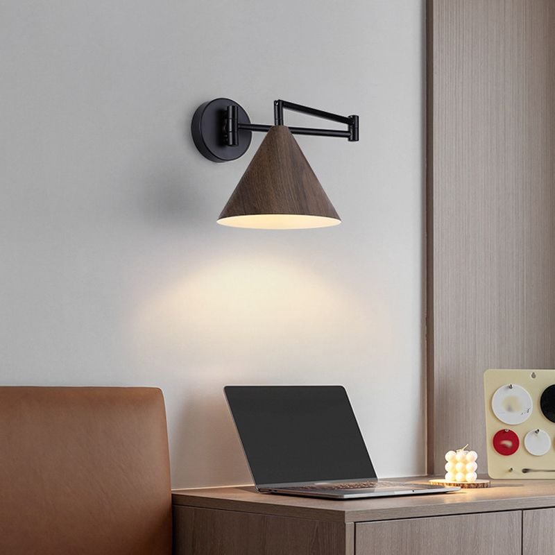 Ozawa dark cone wall lamp over a desk with a laptop and chair