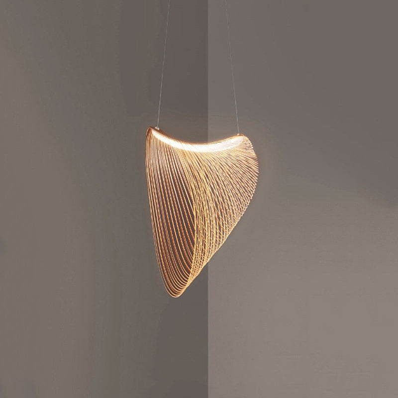 Ozawa wooden pendant with an illuminated wavy top and tapering open-slatted body against a grey wall
