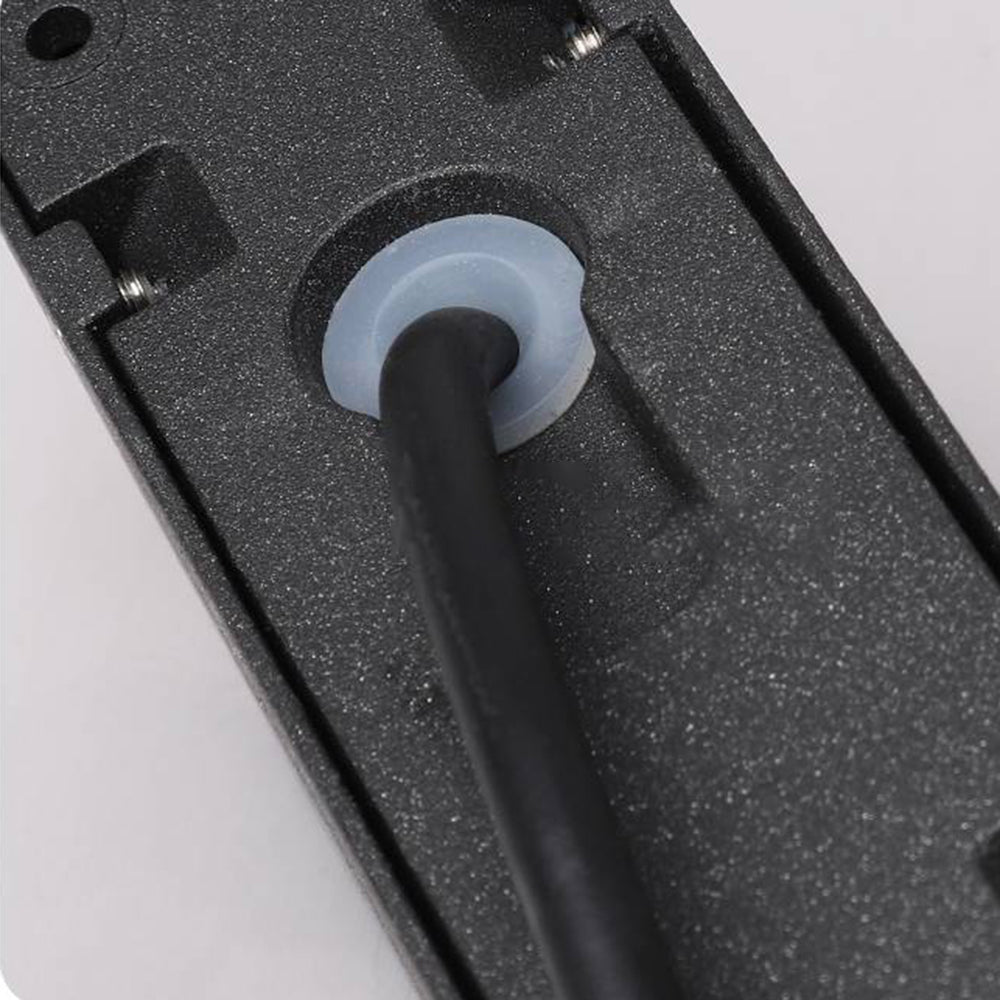 Rear cable entry and pale grommet on the Pena mounting surface