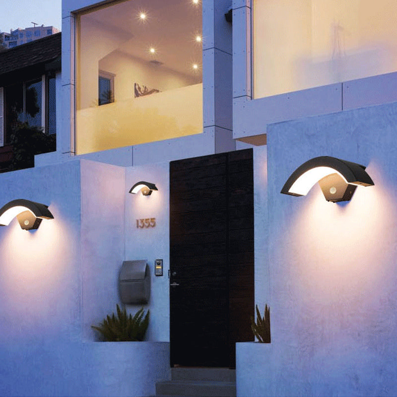 Orr arc lights on an exterior entrance wall