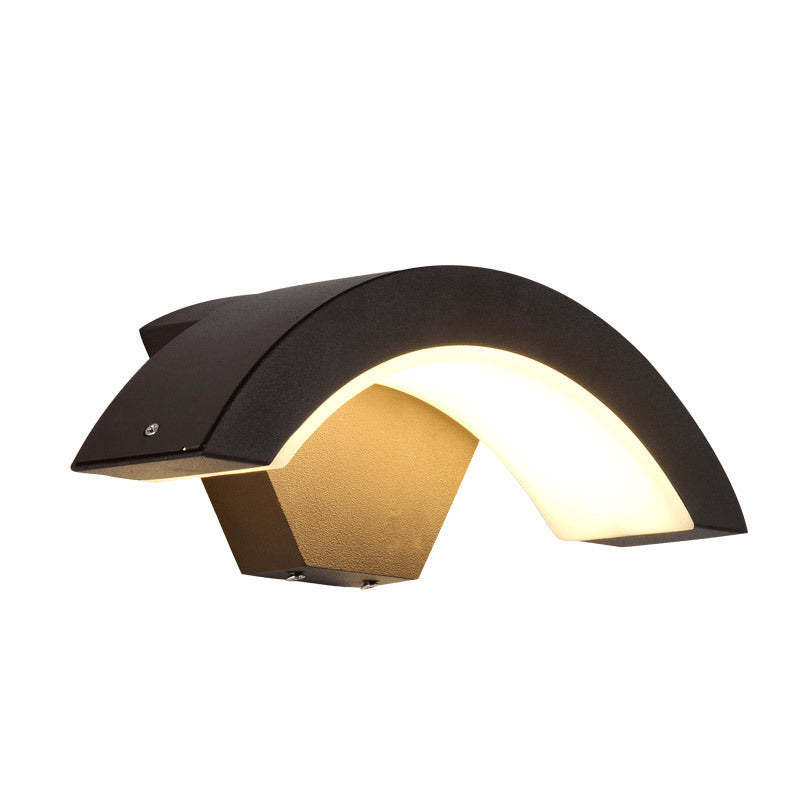 Angled view of Black arc housing and glowing diffuser