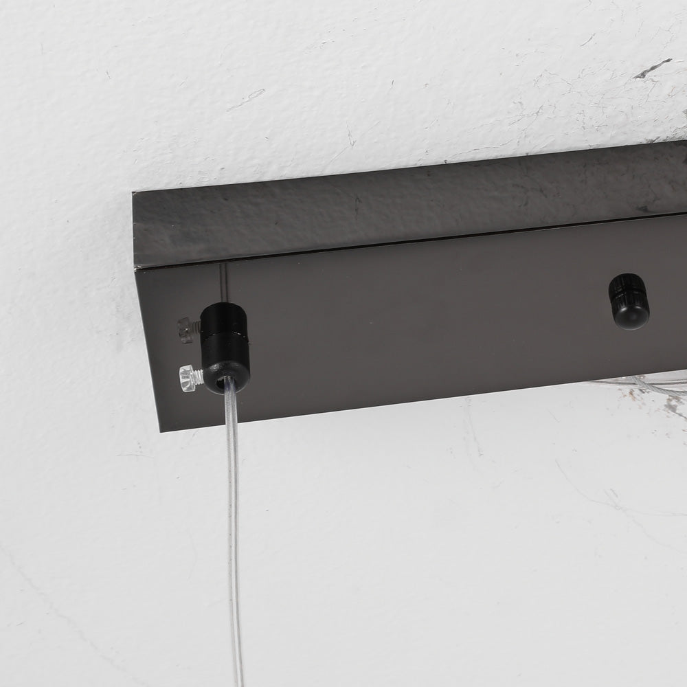 Black rectangular ceiling canopy with suspension cable