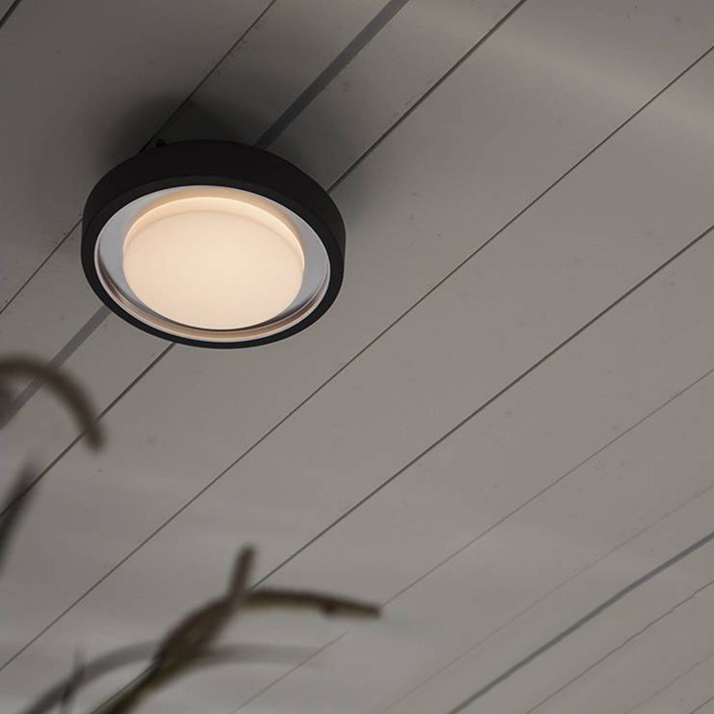 Orr Modern Circular Disc Shape Metal Outdoor Wall Lamp, Black - Cueteks