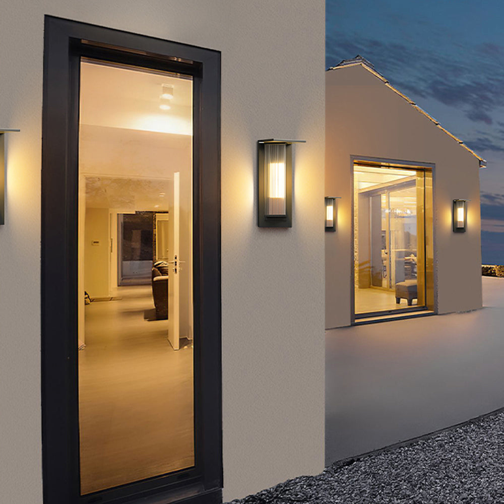 Separate Orr wall lights on both sides of an exterior doorway