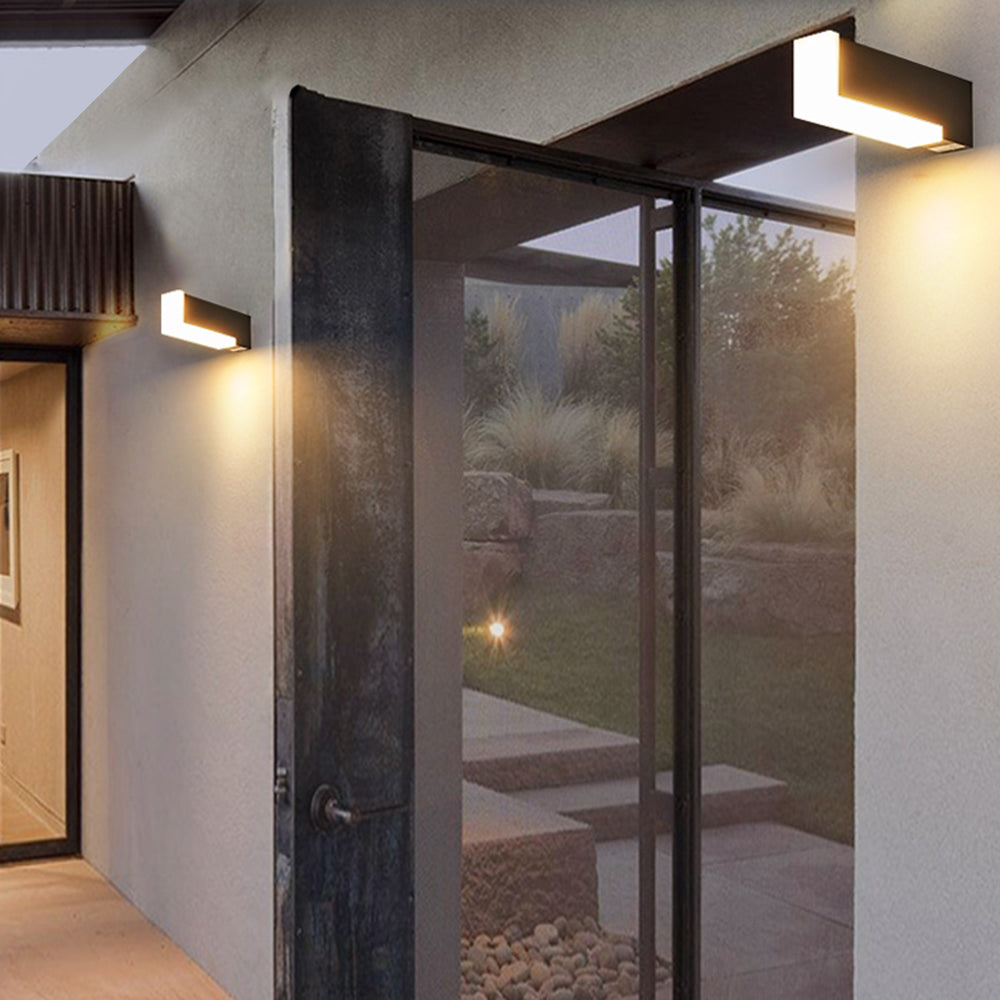 Horizontal Orr wall light above an exterior glazed door