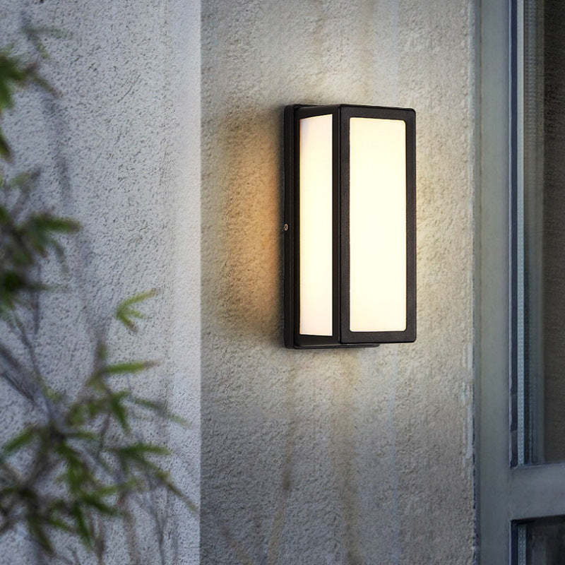Orr wall light glowing beside a window