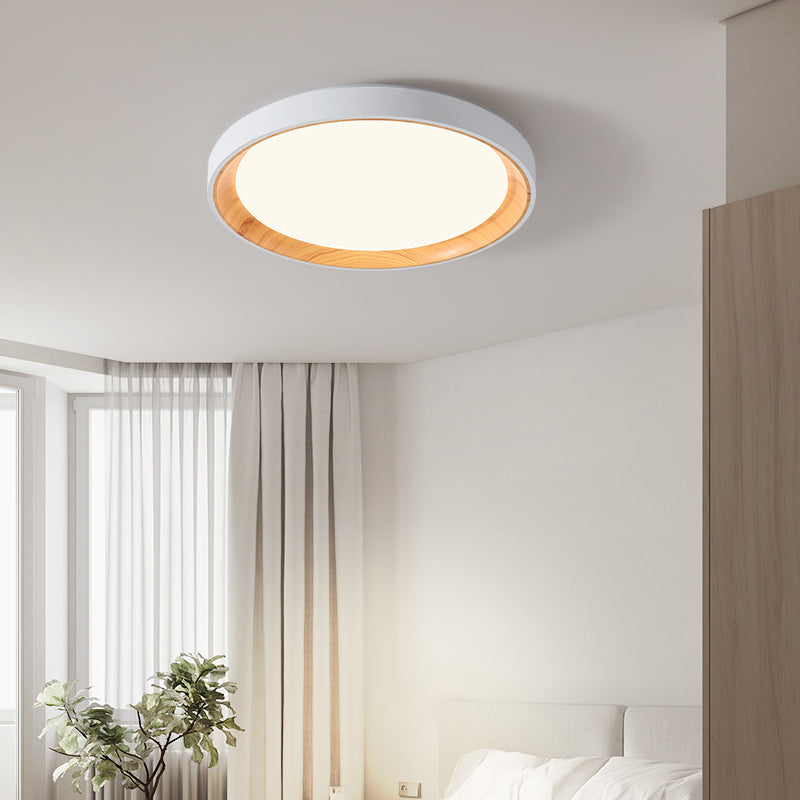 White and light wood-tone Quinn ceiling light above a bedroom