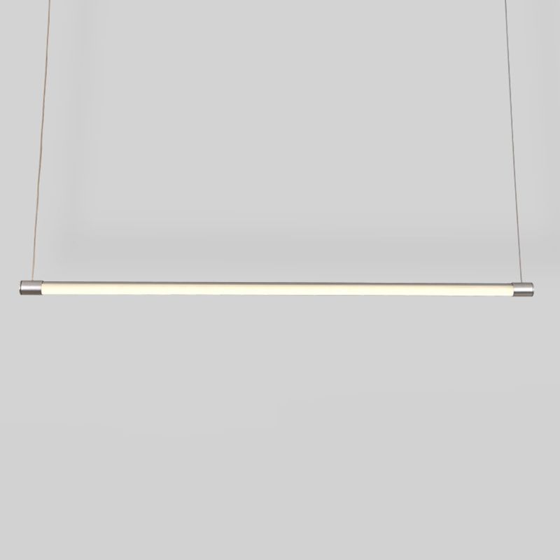 Front view of a silver-endcap bar with warmer-looking illumination and two suspension wires