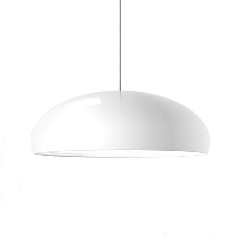 White glossy shallow dome pendant isolated on white with a single suspension cord