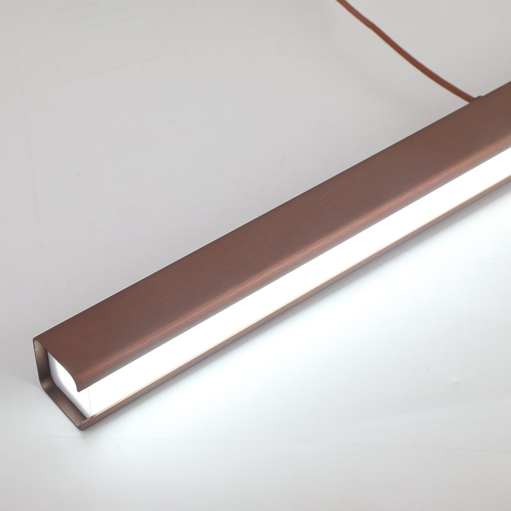 Underside detail of Brown Edge bar showing glowing acrylic diffuser within a brushed metal channel