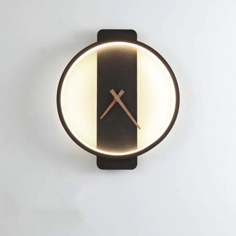 Round-black Nielsen option with a lit circular border and brown hands on its central strip