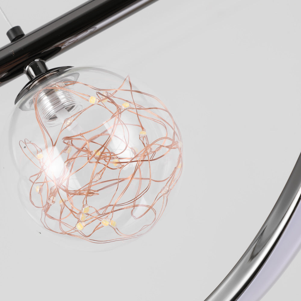 Clear glass globe with fine copper-coloured light wires
