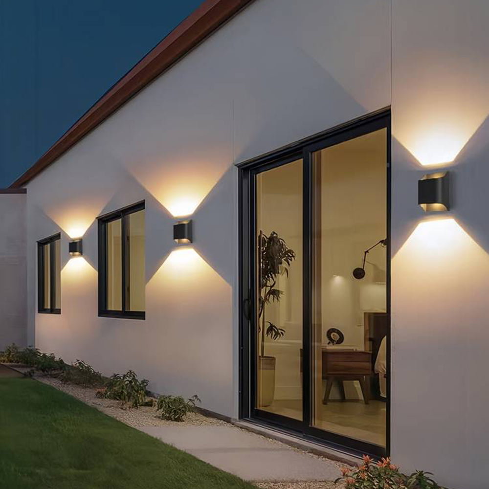 Row of separate Orr up down wall lights along an exterior façade