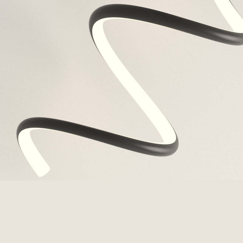 Close view of Louise’s black curved ribbon and continuous pale acrylic lighting face