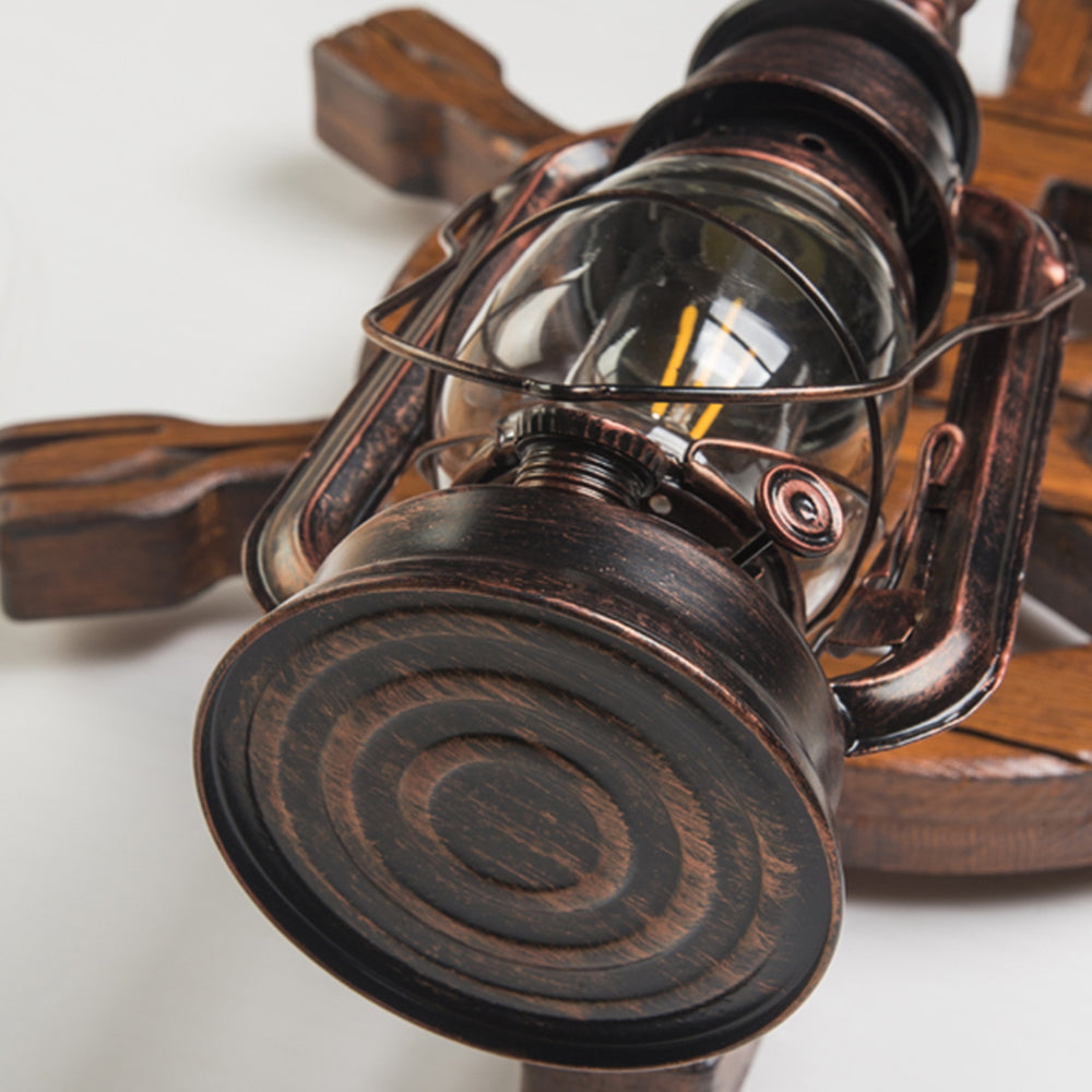 Underside detail of Austin lantern with circular metal base and glass enclosure
