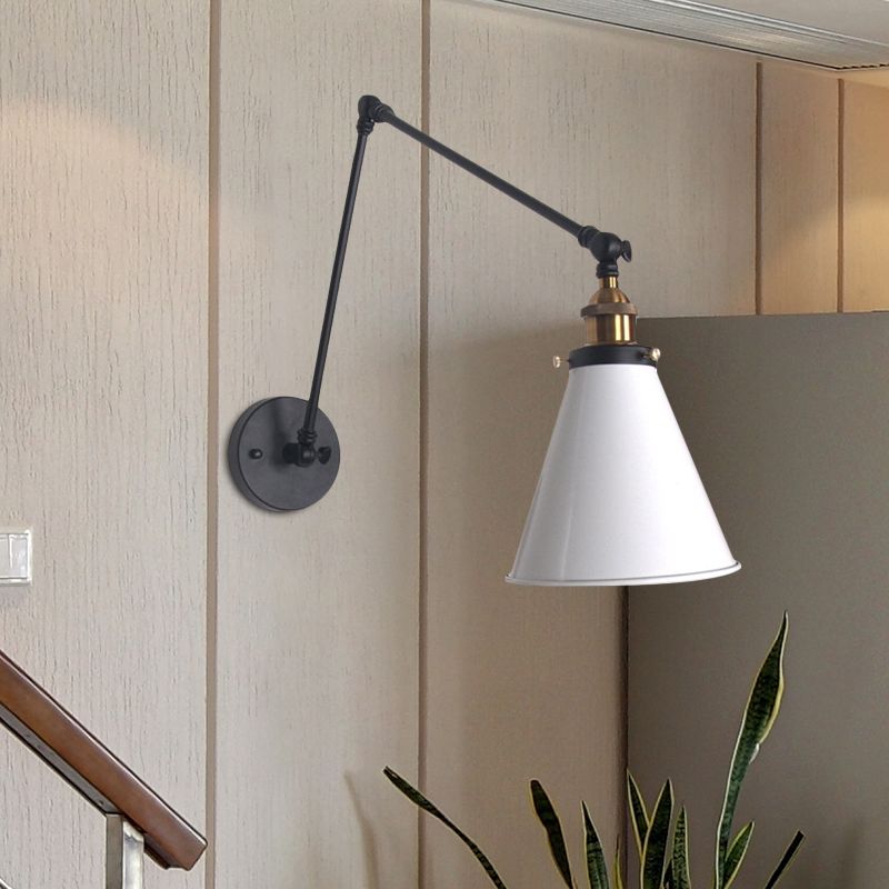 Brady White conical shade on black jointed arm and round plate beside a stair rail and plant