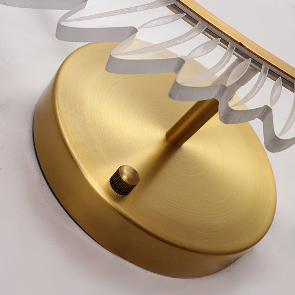 Close-up of Kristy round gold-tone wall plate, support stem, knurled fastener and clear wing edge