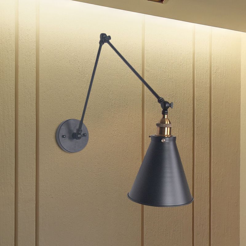 Brady Black conical shade and jointed arm on a tan vertically paneled wall