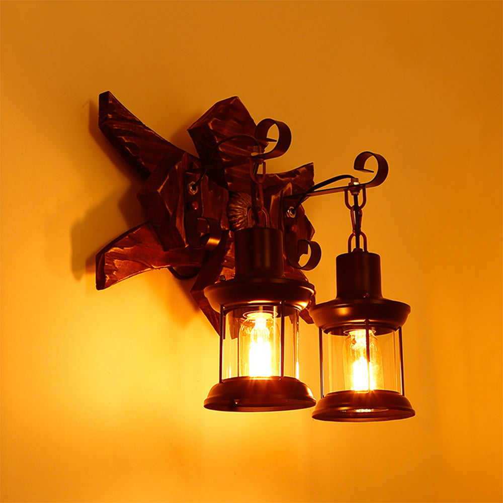 Angled view of the Austin wooden backplate and two glowing lantern-style shades.