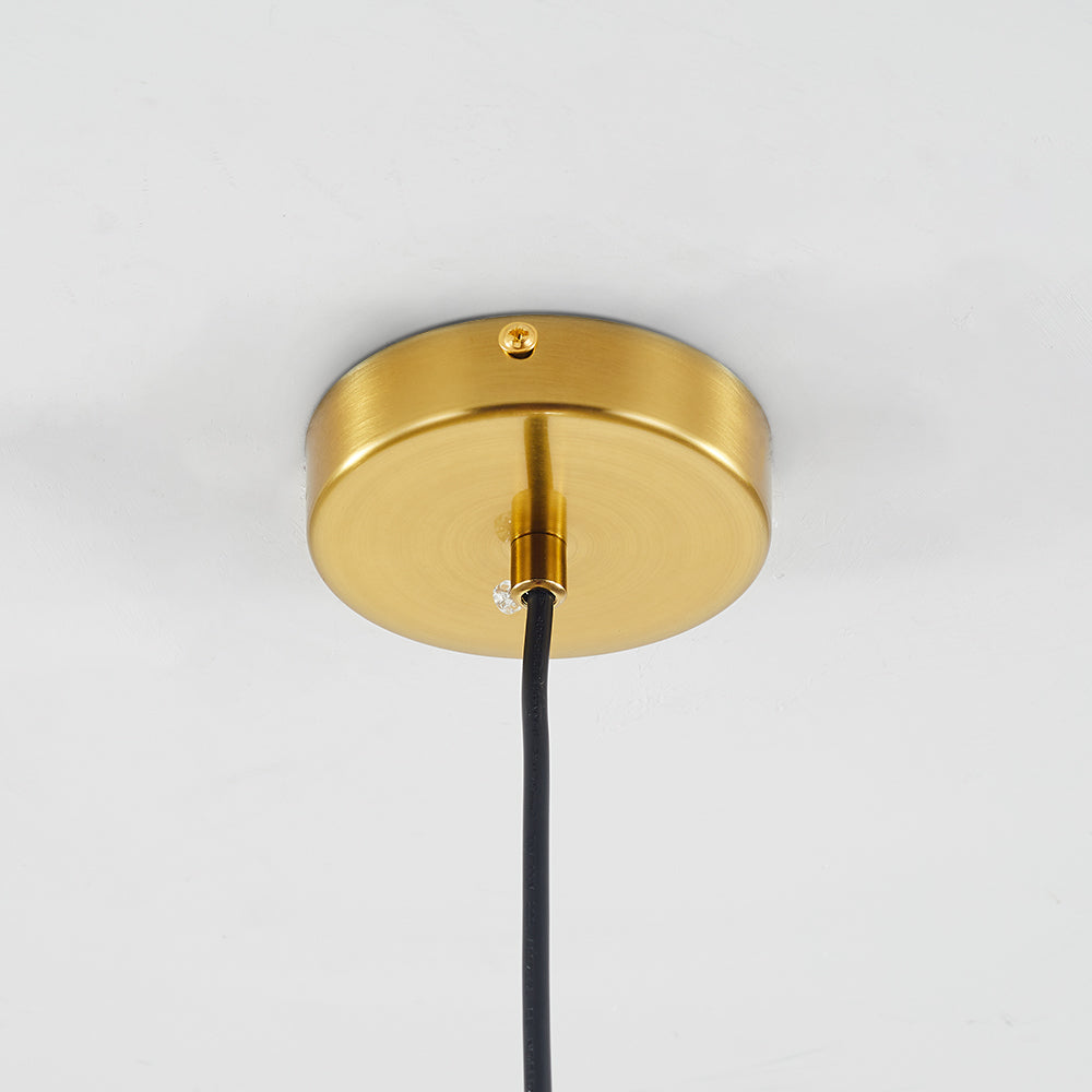 Round gold-tone ceiling canopy with a black hanging cord