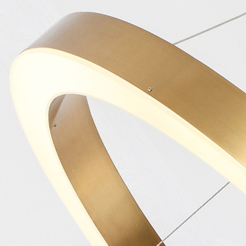 Close view of gold-colour ring and luminous acrylic edge