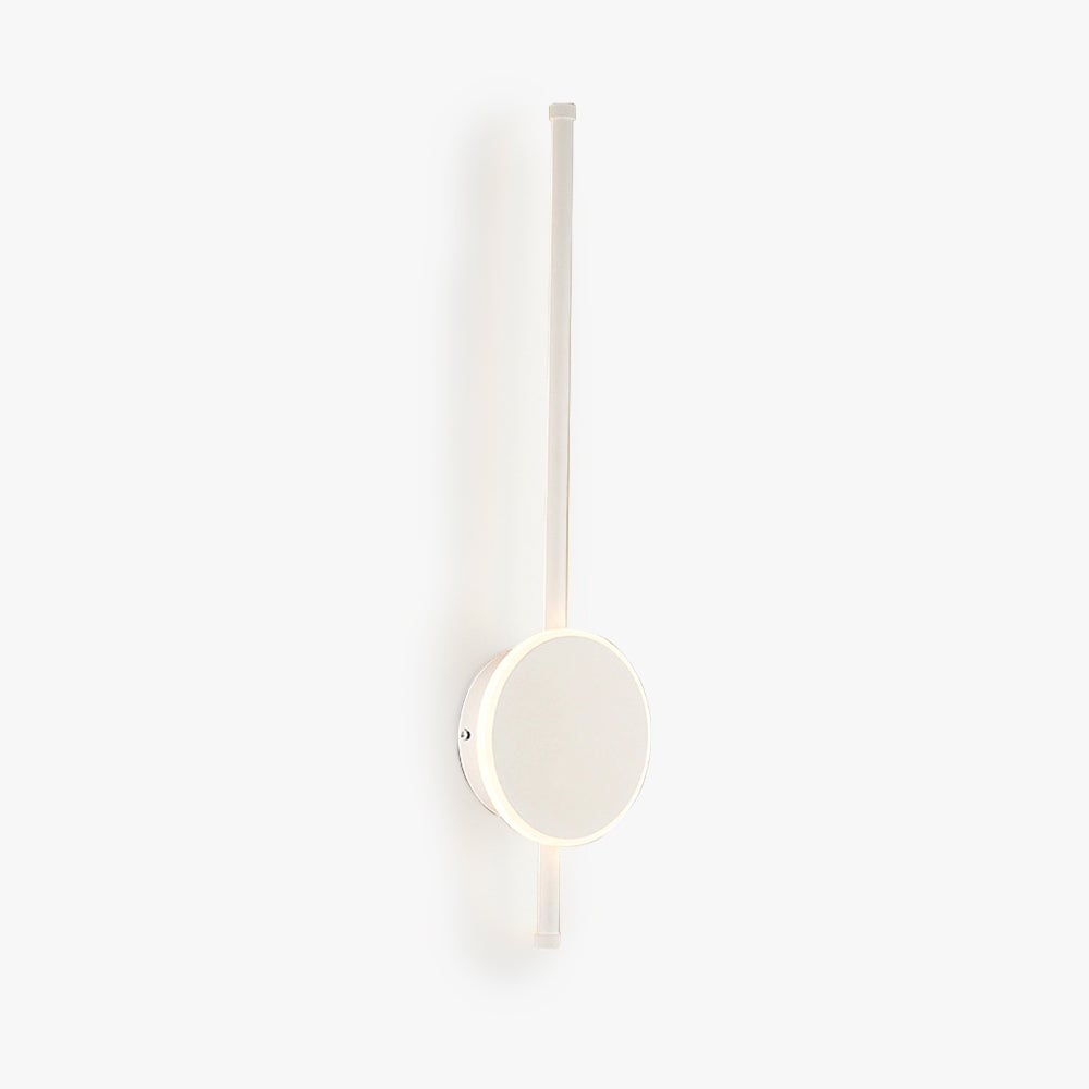 Unlit white disc and slender rod on a pale background
