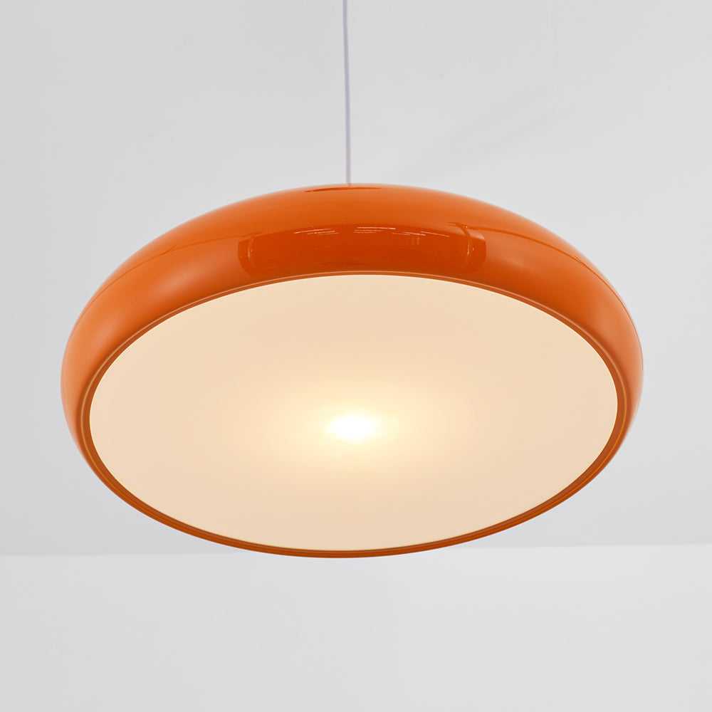 Orange dome seen from below with a broad pale illuminated panel inside the curved rim