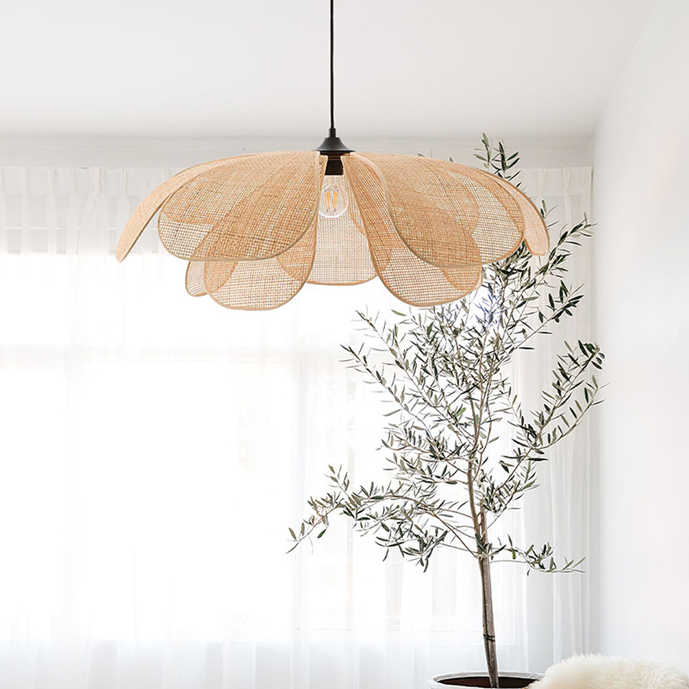 Ritta wide flower-like woven shade against pale curtains
