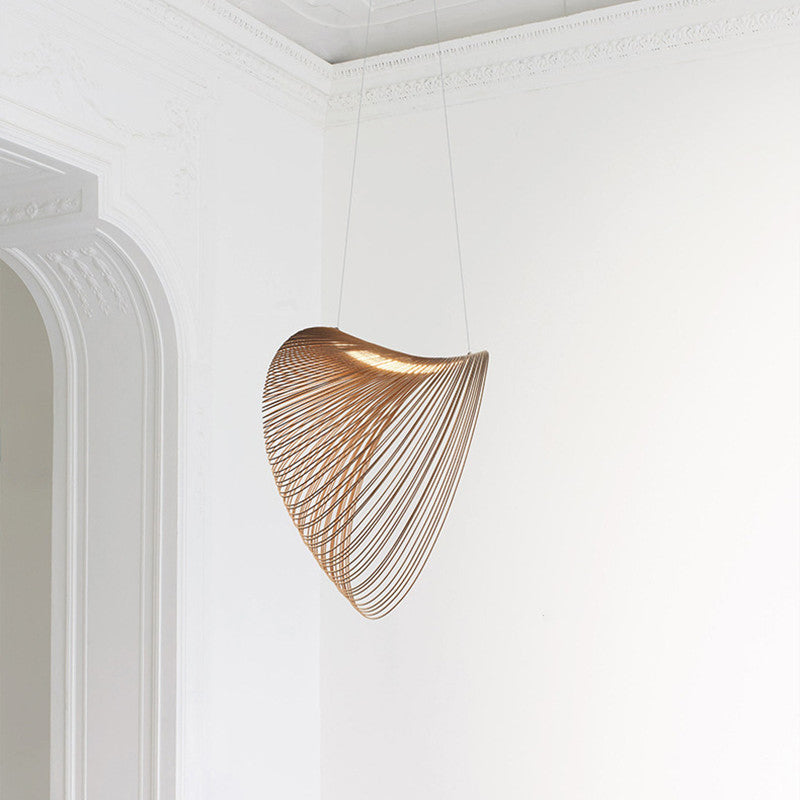 Ozawa loop pendant suspended against pale wall mouldings