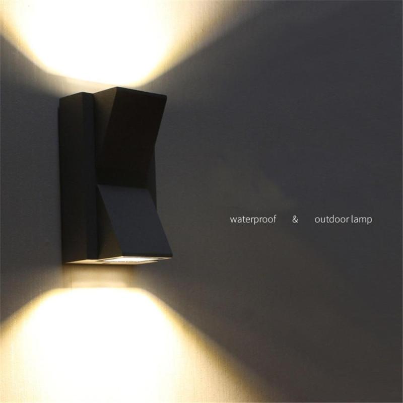 Black Orr two-head wall light with upward and downward beams