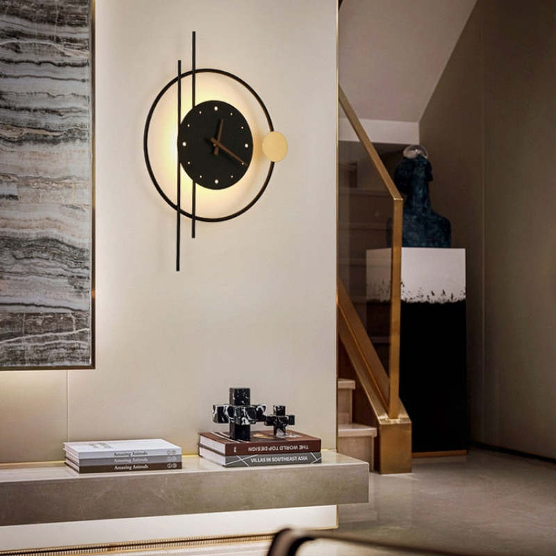 Black clock lamp glowing near a staircase