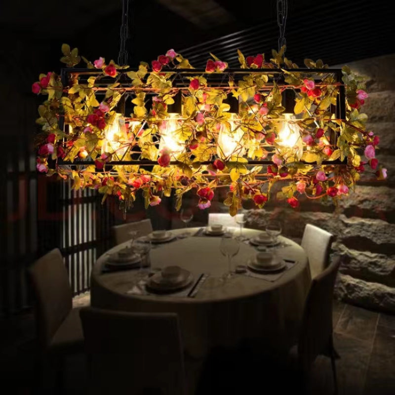 Autumn-colored Nest pendant glowing over a dining table