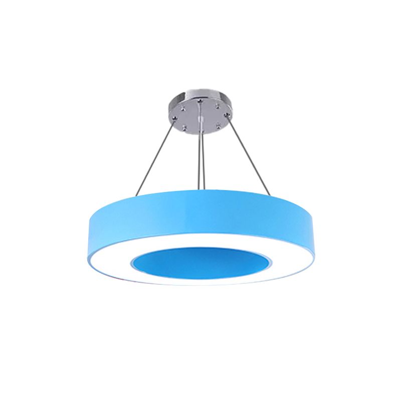 Isolated blue Morandi ring in oblique underside view with white lower face and silver-tone canopy on white