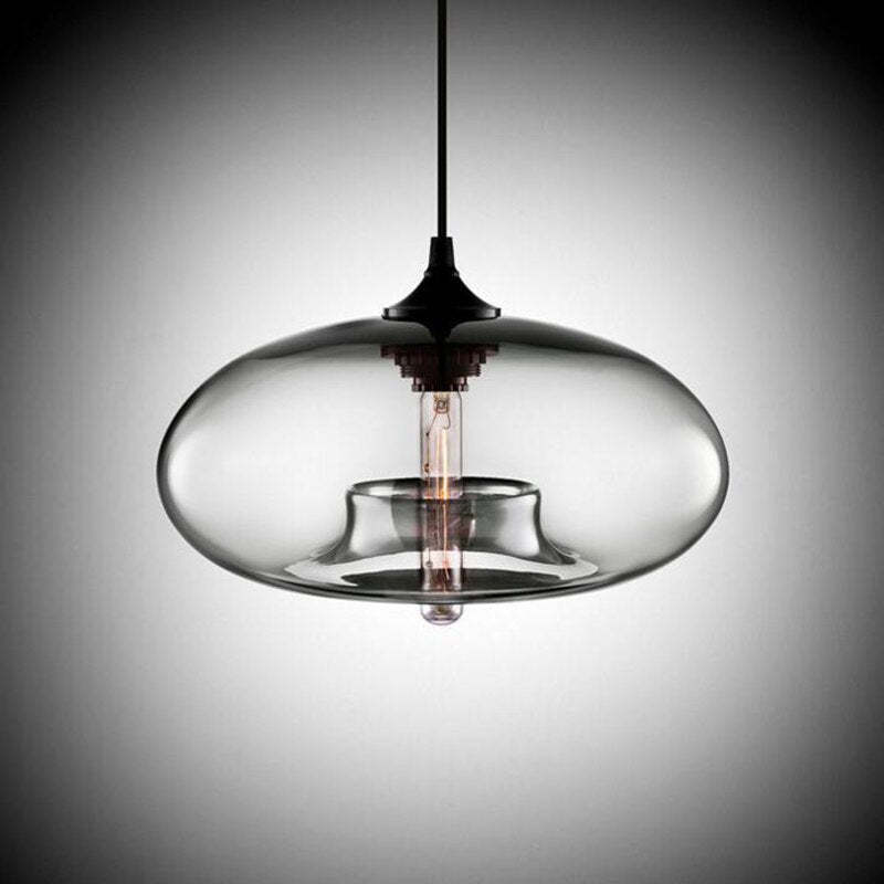 Gray-toned translucent oval glass shade with Black cap, cable and central bulb against a Dark gradient background