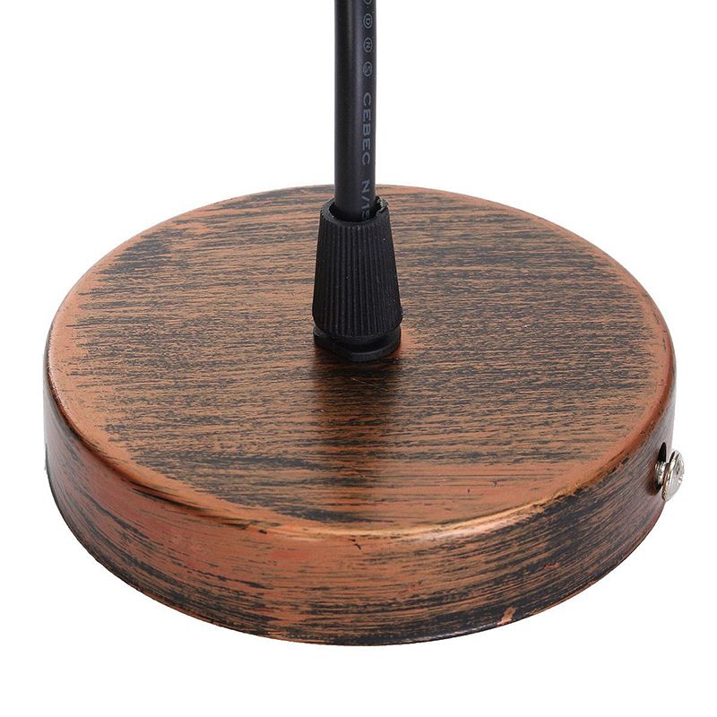 Round copper-colour ceiling canopy with central black cord
