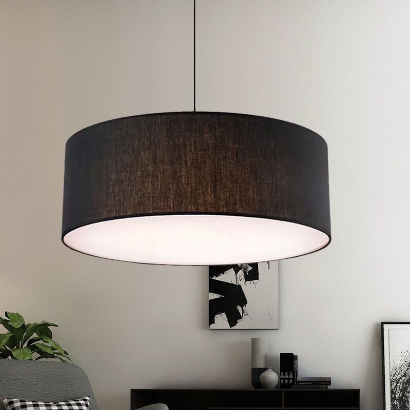 Black Renée fabric pendant above a seating area