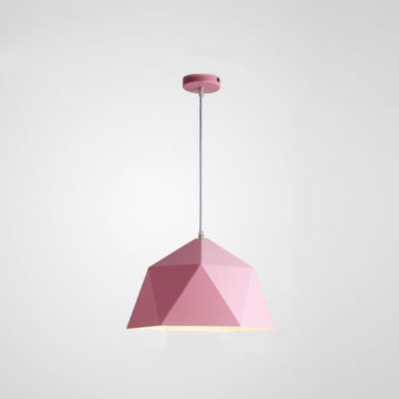 Pink faceted metal pendant shade with a pale cord and round pink ceiling canopy