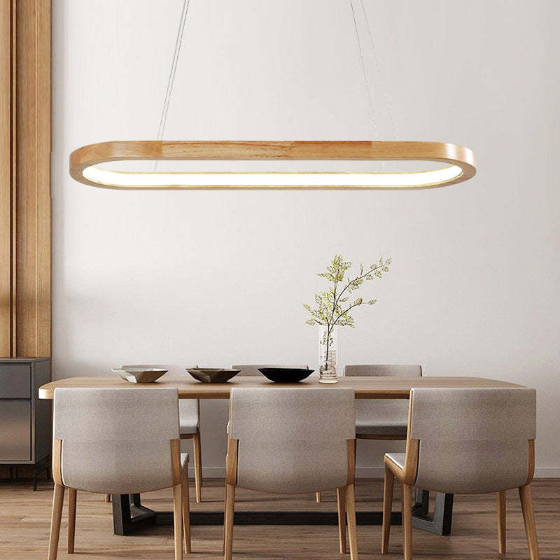 Ozawa wood-toned oval LED pendant over dining table