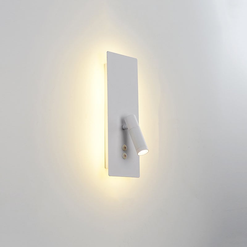 White Orr spotlight with a softly lit wall behind it