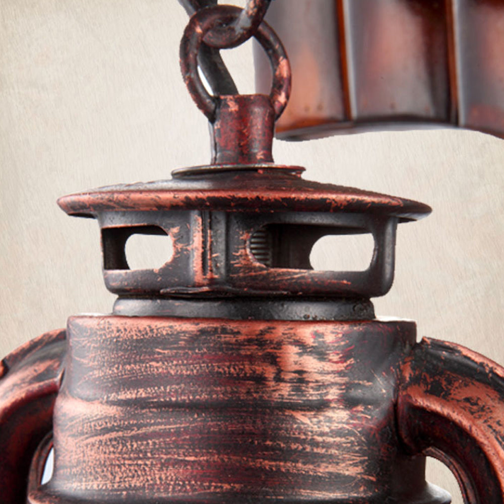 Detail of the Austin lantern top with dark metal and copper-coloured distressed finish.