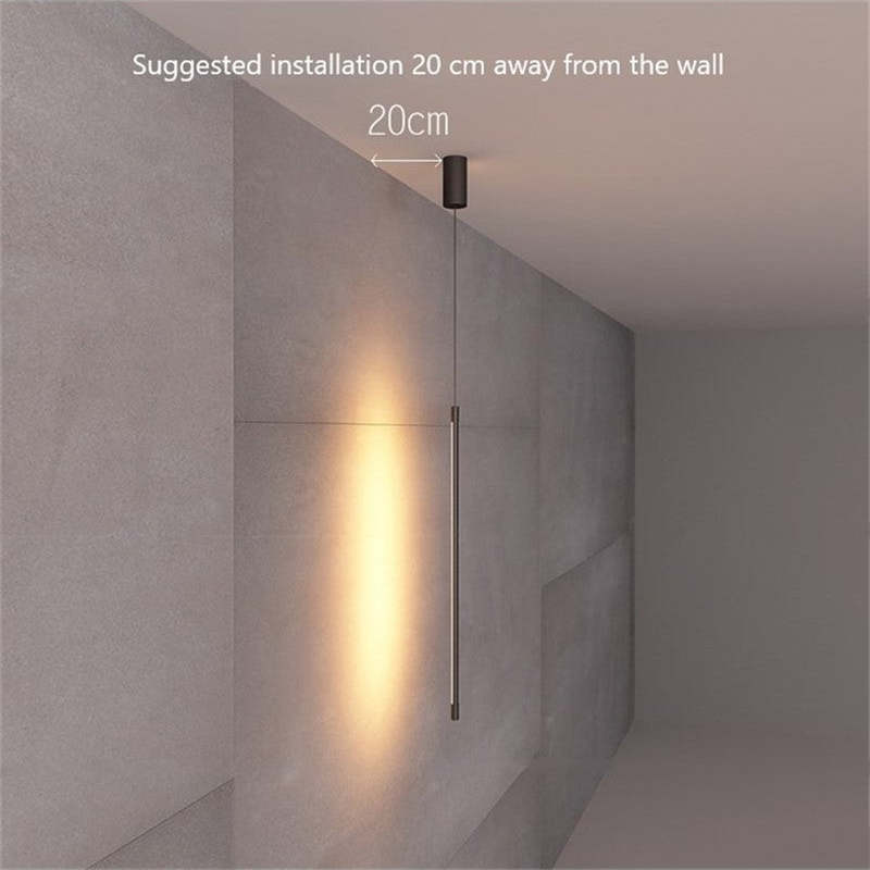 Edge pendant beside a wall with an illustrated 20 cm installation distance