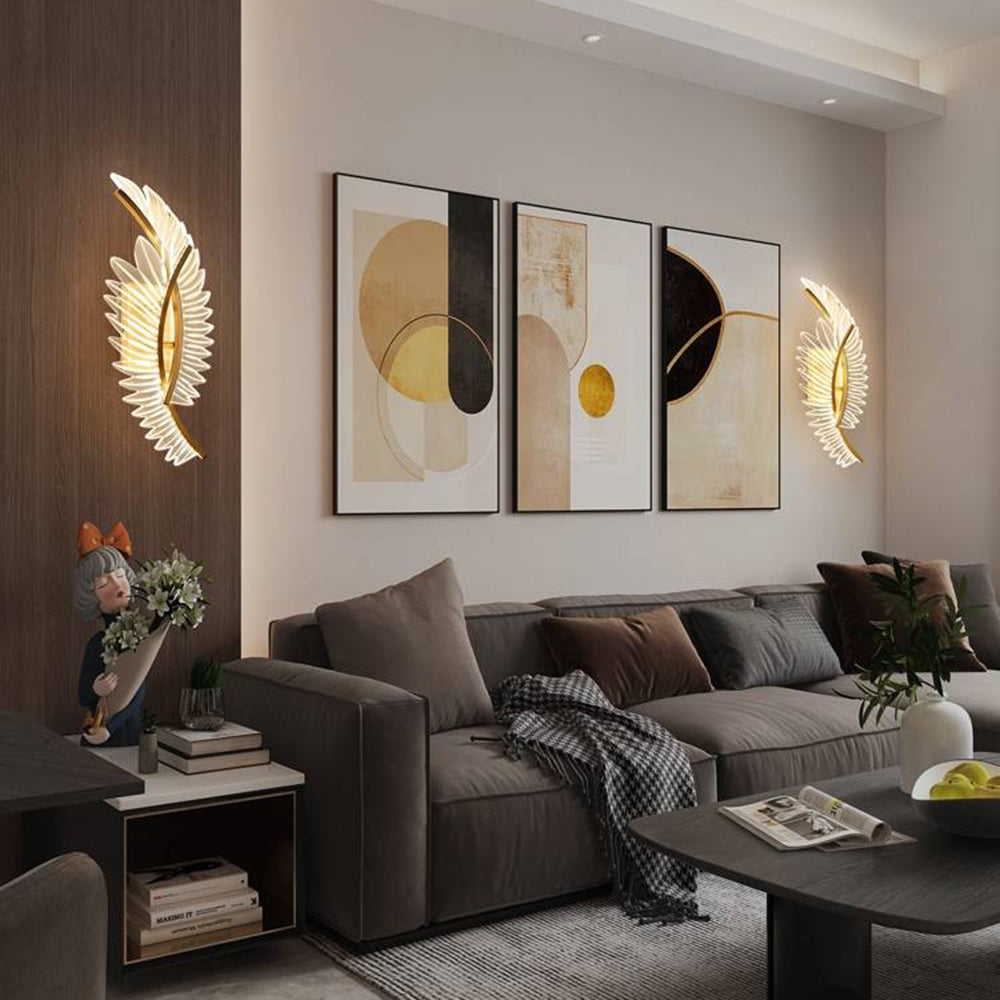 Two separate Kristy Double wing wall lights around framed artwork above a grey sofa