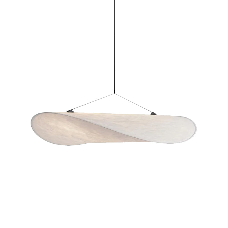 Renée pendant on white showing its diagonal curled profile and fine black suspension lines