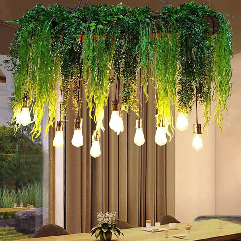Green rectangular pendant above a dining table beside curtains and a window.