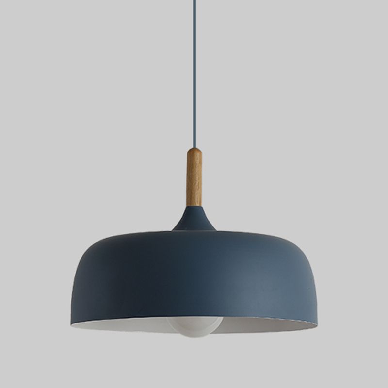 Blue deeper dome pendant with a dark cord and wood-grain-look collar