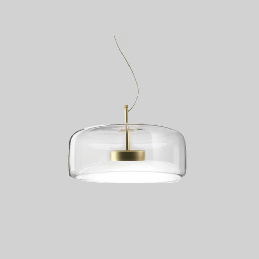 Isolated broad clear Hailie glass shade with gold-tone central light housing and pale suspension lines